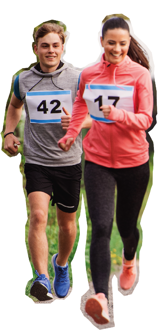 A large group of active multi generation people running a race competition in nature.
